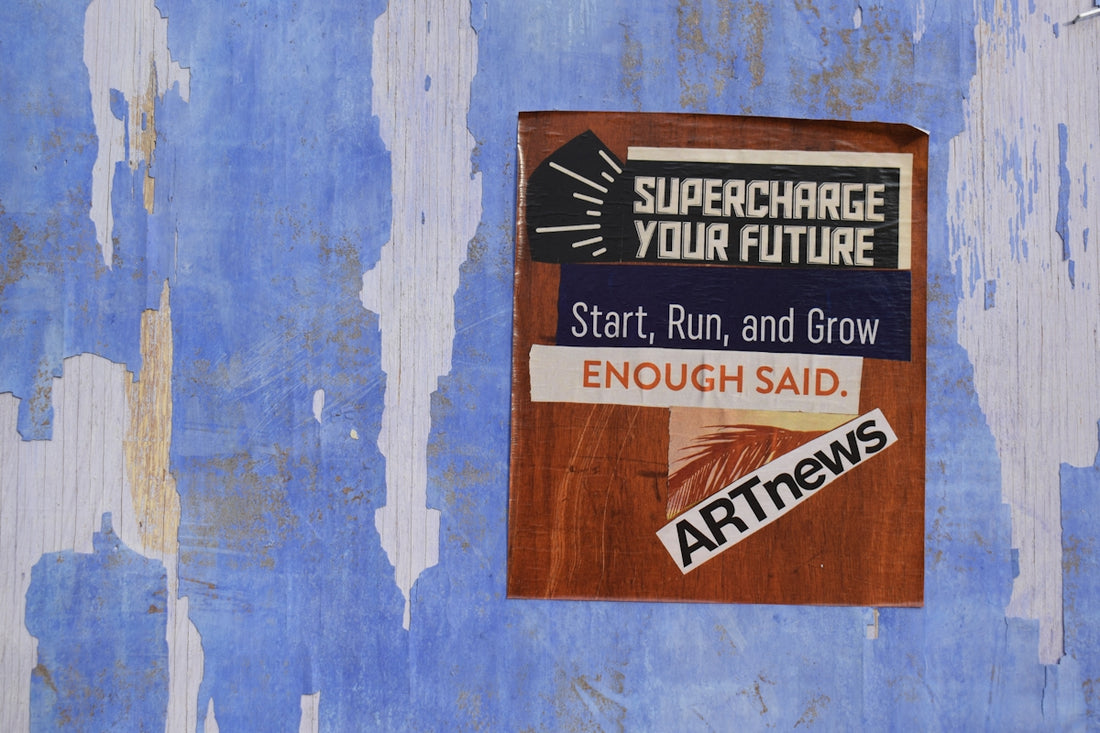 a blue wall with a sign on it that says, supercharge your future